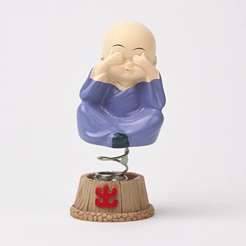 Set of four handcrafted brass baby Buddha statues, each with a serene expression, symbolizing tranquility and positive energy