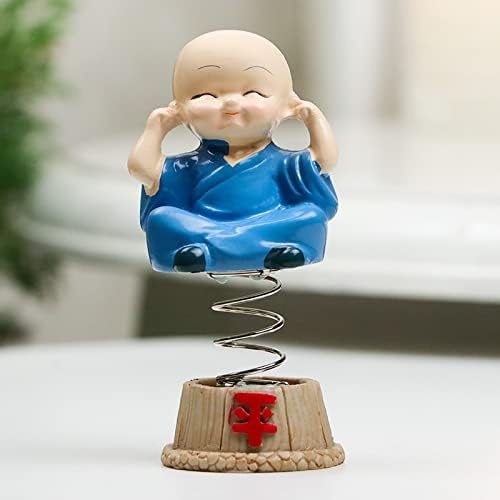 Set of four handcrafted brass baby Buddha statues, each with a serene expression, symbolizing tranquility and positive energy