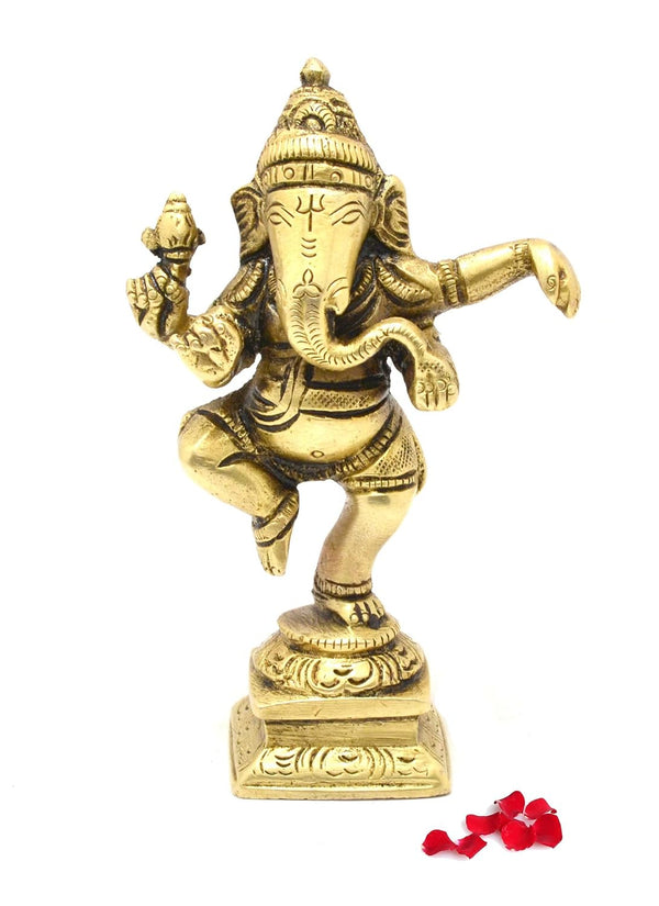 Handmade brass Dancing Ganesha idol, measuring 3.7 x 3.7 x 11.2 cm, symbolizing joy and triumph over obstacles for spiritual decor.