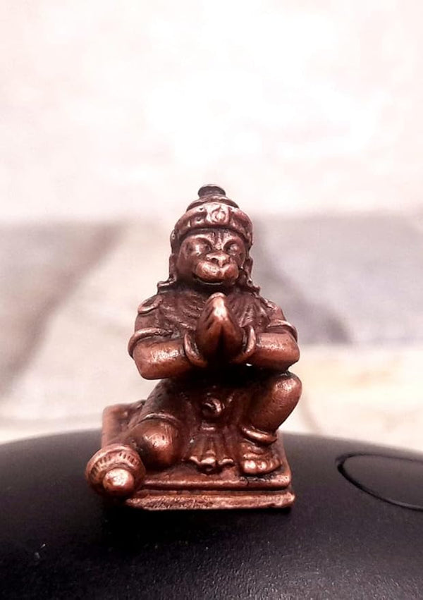 Handcrafted copper idol of Lord Hanuman, showcasing strength and devotion, perfect for home or office altar.