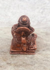 Handcrafted copper idol of Lord Hanuman, showcasing strength and devotion, perfect for home or office altar.