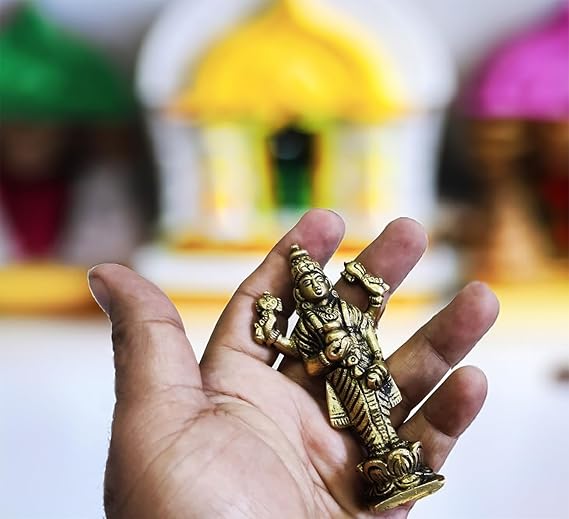 Handmade Lord Dhanvantri idol crafted from zinc alloy, featuring intricate details, perfect for home altar or pooja room, symbolizing health and healing