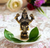 Handmade Lord Dhanvantri idol crafted from zinc alloy, featuring intricate details, perfect for home altar or pooja room, symbolizing health and healing