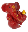 Handmade Lord Ganesha idol made of resin, featuring intricate detailing and a compact design. Dimensions: 6.5L x 4W x 6.5H cm