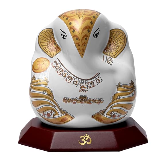 Handmade Lord Ganesh idol for car dashboard and home decor, crafted from ceramic, measuring 5.5L x 3.5W x 5.5H cm, symbolizing wisdom and prosperity