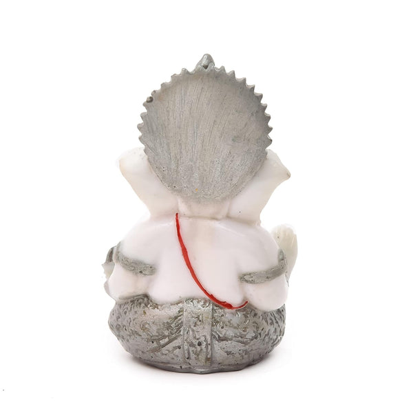 Handmade Lord Ganesh idol for car dashboard, crafted from marble, measuring 5.1L x 5.1W x 7.6H cm, symbolizing wisdom and prosperity