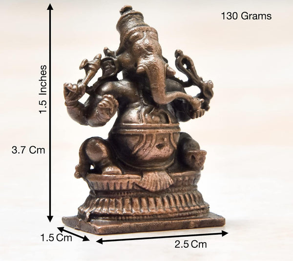 Handmade copper statue of Lord Ganesha, measuring 2.5 x 1.5 x 3.7 cm, symbolizing wisdom and prosperity, perfect for altars and home decor.
