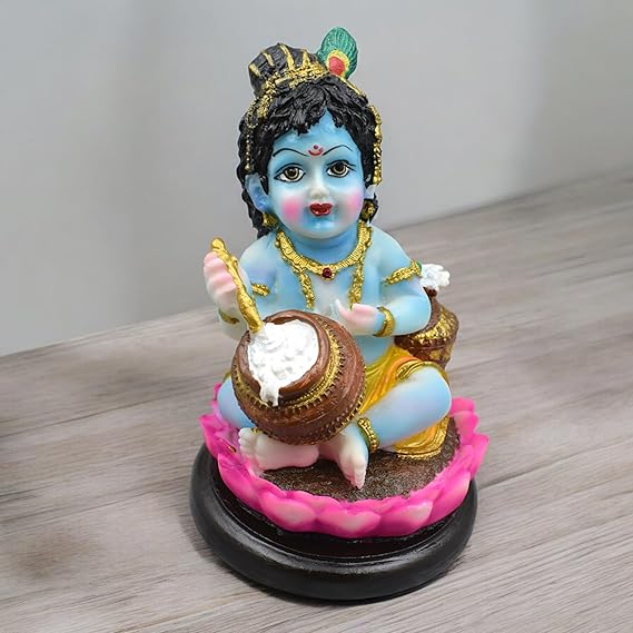 Handmade Lord Krishna Makhan Chor idol, crafted from high-quality resin, featuring vibrant colors and intricate detailing, capturing Krishna's playful charm