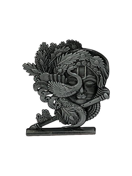 Delicate leaf-shaped Lord Krishna idol in metal, showcasing intricate detailing, perfect for enhancing spiritual spaces or home decor.