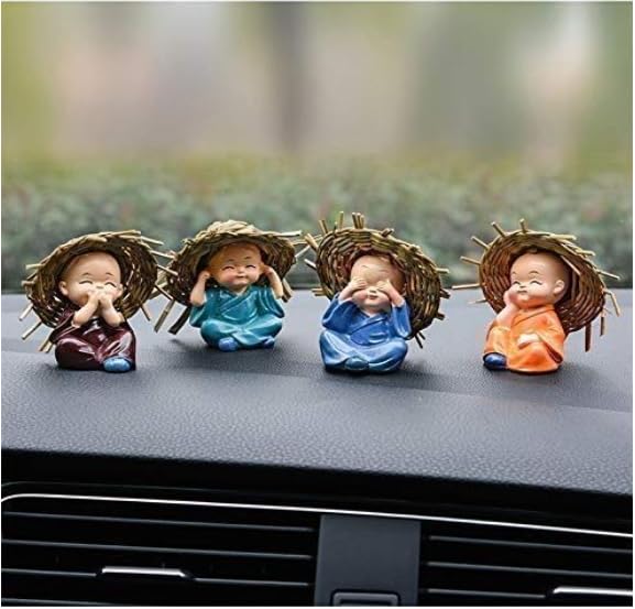 Collection of four miniature Buddha monk statues made from durable resin, ideal for indoor and outdoor decor, promoting tranquility and mindfulness