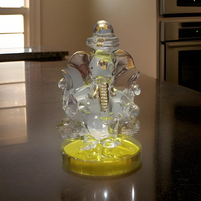 Elegant handmade resin Ganesha idol with a crystal finish, perfect for enhancing office and car dashboard decor, symbolizing wisdom and prosperity."