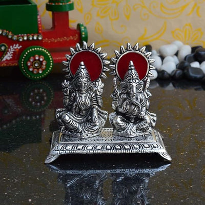 White Metal Statue of Laxmi and Ganesha