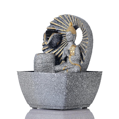 A water fountain featuring a statue of Buddha, the founder of Buddhism, surrounded by cascading waterfalls or a serene pool of water. The fountain may be made of stone, marble, or other materials and may have additional decorative elements, such as plants or lights.