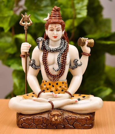 A large, handcrafted resin statue of Lord Shiva, standing tall with his trident and cobra. Perfect for home altars or as a centerpiece.