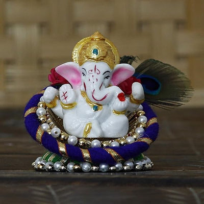 A handcrafted resin statue of Lord Ganesha, the Hindu deity known for wisdom and removing obstacles. The statue is intricately detailed and perfect for altars or home decor.