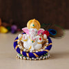A handcrafted resin statue of Lord Ganesha, the Hindu deity known for wisdom and removing obstacles. The statue is intricately detailed and perfect for altars or home decor.