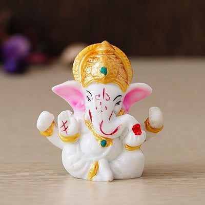A handcrafted resin statue of Lord Ganesha, the Hindu deity known for wisdom and removing obstacles. The statue is intricately detailed and perfect for altars or home decor.