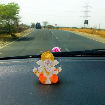 This beautiful statue of Lord Ganesha, the Hindu god of wisdom and remover of obstacles, is a perfect addition to any home or office. Crafted with exquisite detail, the idol captures the essence of the deity, making it a captivating centerpiece. Ganesha is often worshipped before undertaking new ventures, as he is believed to bring good fortune and remove any potential obstacles. 