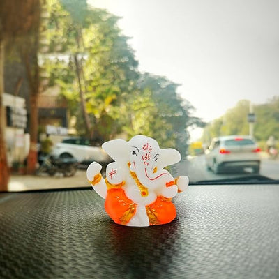 A statue of Lord Ganesha, the Hindu god of wisdom and remover of obstacles, suitable for home decor.