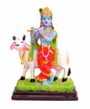  A depiction of Lord Krishna, the eighth avatar of Vishnu, often depicted as a young boy playing the flute.