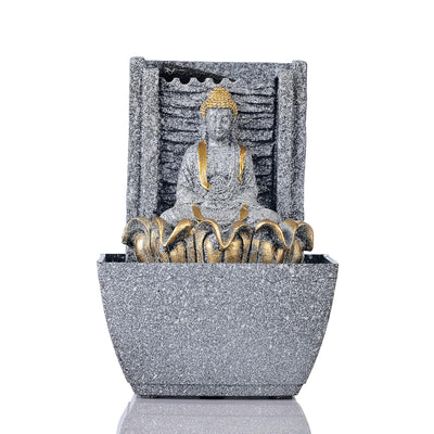 A water fountain featuring a statue of Lord Buddha, the founder of Buddhism, surrounded by cascading waterfalls or a serene pool of water. The fountain may be made of stone, marble, or other materials and may have additional decorative elements, such as plants or lights.
