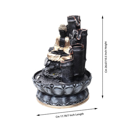 A small, tabletop fountain made of polyresin, a durable and lightweight material. Water flows through the fountain, creating a soothing sound. The fountain may have additional decorative elements, such as rocks, plants, or a figurine.