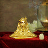 Handcrafted resin mini idol of Adiyogi with a copper finish, symbolizing knowledge and inspiration for yoga, ideal for home altars.