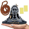 Handmade Adiyogi Shiva statue with Rudraksha mala, designed for car dashboards and home altars, showcasing intricate details and craftsmanship