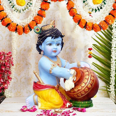 A beautifully crafted resin sculpture of Baby Krishna as the Makhan Chor, showcasing intricate details and vibrant colors, ideal for home decor.