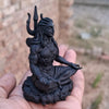 Handcrafted Black Adiyogi Shiva statue made of durable resin, showcasing intricate details, ideal for home decor and spiritual spaces.