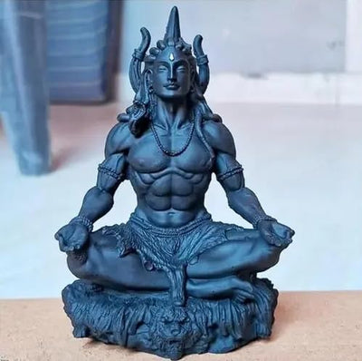 Handcrafted Black Adiyogi Shiva statue made of durable resin, showcasing intricate details, ideal for home decor and spiritual spaces.