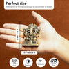 "Handmade brass Ganesha idol measuring 6 cm x 3 cm x 7 cm, symbolizing wisdom and prosperity, ideal for home decor and altars."