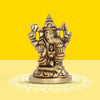 Handcrafted brass Ganesha idol symbolizing prosperity and wisdom, ideal for home décor or altar.