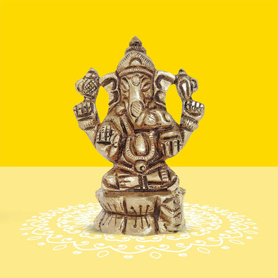 Handcrafted brass Ganesha idol seated on a lotus flower, symbolizing wisdom and prosperity, perfect for any altar or decorative space.