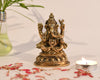  Handmade brass Ganesha idol, ideal for pooja room or as a collectible. Dimensions: 5.6L x 6.1W x 10.2H cm, 460 grams.