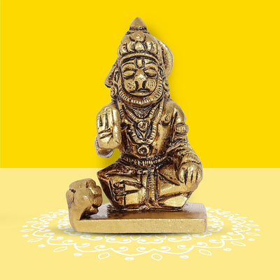 A handcrafted brass Hanuman idol, 7.4 cm tall, symbolizing strength and devotion, ideal for home decor and spiritual altars.