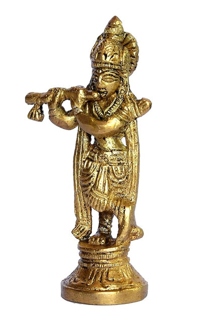 Exquisite brass Krishna Murti depicting the playful spirit of Lord Krishna, handcrafted and designed for home decor and spiritual significance.