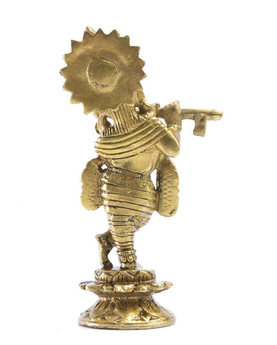 Handcrafted brass Lord Krishna statue, intricately detailed and 14 cm tall, ideal for home decor, altar, or as a thoughtful gift.