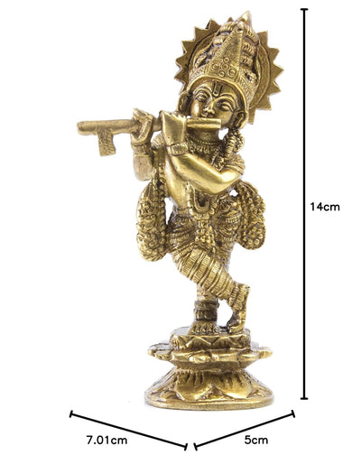 Handcrafted brass Lord Krishna statue, intricately detailed and 14 cm tall, ideal for home decor, altar, or as a thoughtful gift.