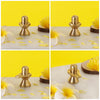 Handcrafted pure brass Shivling idol, symbolizing Lord Shiva's transformative energy, featuring intricate details and a warm golden glow.