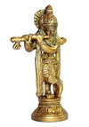A beautifully crafted brass Murti of Lord Krishna, capturing his playful spirit. The idol is adorned with intricate details and vibrant colors.