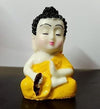 Collection of four serene Buddha monk statues made from durable resin, ideal for indoor and outdoor decor, promoting tranquility and harmony
