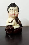 Collection of four serene Buddha monk statues made from durable resin, ideal for indoor and outdoor decor, promoting tranquility and harmony