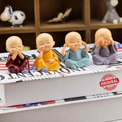 Set of 4 multicolor handcrafted resin Buddha monk statues, each uniquely designed to enhance home decor and create a tranquil ambiance