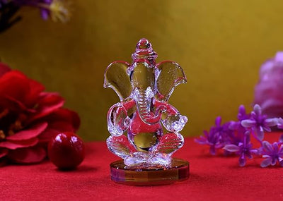 Charming handmade glass Ganesha idol, weighing 300g, ideal for altars or car dashboards, featuring intricate craftsmanship and divine elegance."