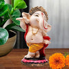 Handcrafted Dancing Ganesh showpiece made of resin, measuring 8 x 8 x 14 cm and weighing 250g. A symbol of spirituality and Indian craftsmanship, ideal for decor or gifting.