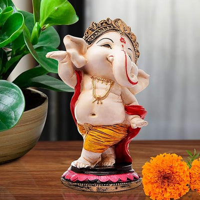 Handcrafted Dancing Ganesh showpiece made of resin, measuring 8 x 8 x 14 cm and weighing 250g. A symbol of spirituality and Indian craftsmanship, ideal for decor or gifting.