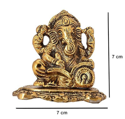 Handcrafted brass Ganesha idol with antique finish, measuring 7x4x7 cm and weighing 400g. Ideal for home decor, altars, or gifting. Symbolizes wisdom and prosperity.