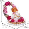 Captivating Lord Ganesha idol on a floral throne, dimensions 9x9x9.5 cm, weighing 200 grams, crafted from high-quality resin.