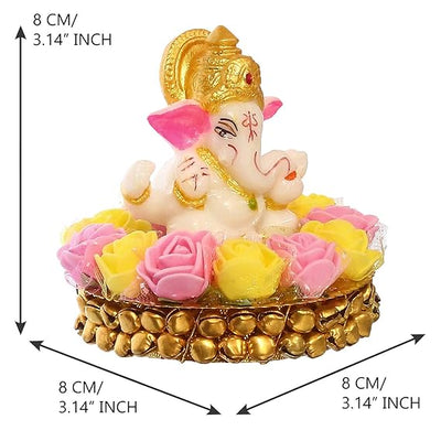 Handcrafted Lord Ganesha idol made of vibrant resin, measuring 8x8x8 cm, symbolizing prosperity and wisdom, placed on a decorative plate.